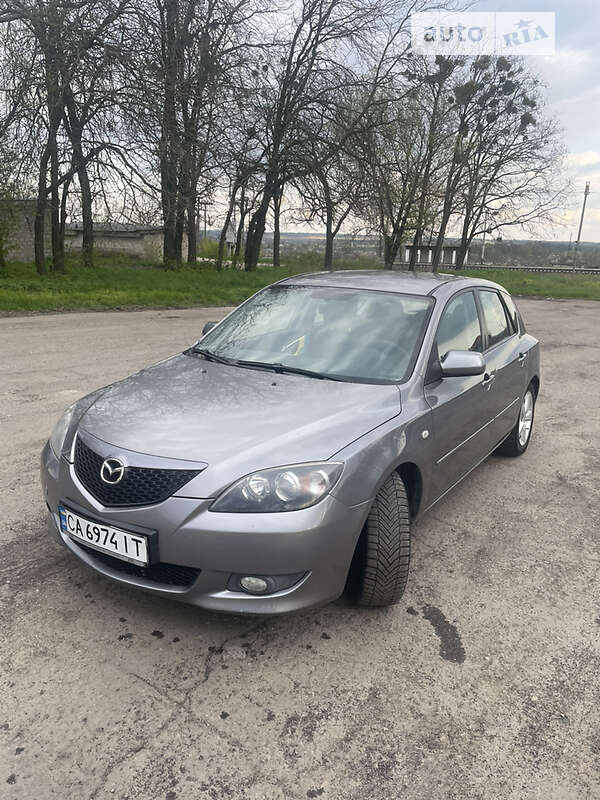 2006 Mazda 3, VIN JMZBK14Z261355228:plate — photo 1 (autoria)