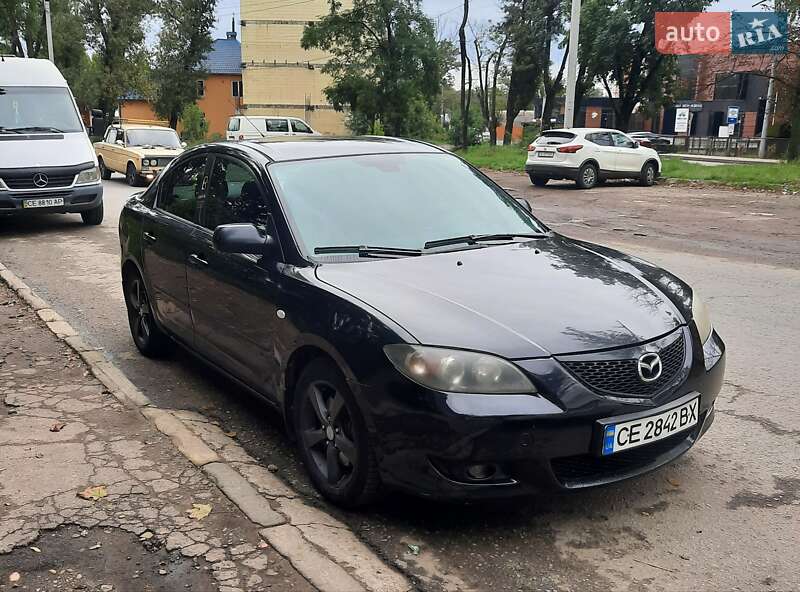 Седан Mazda 3 2004 в  фото Седан Mazda 3 2004 в