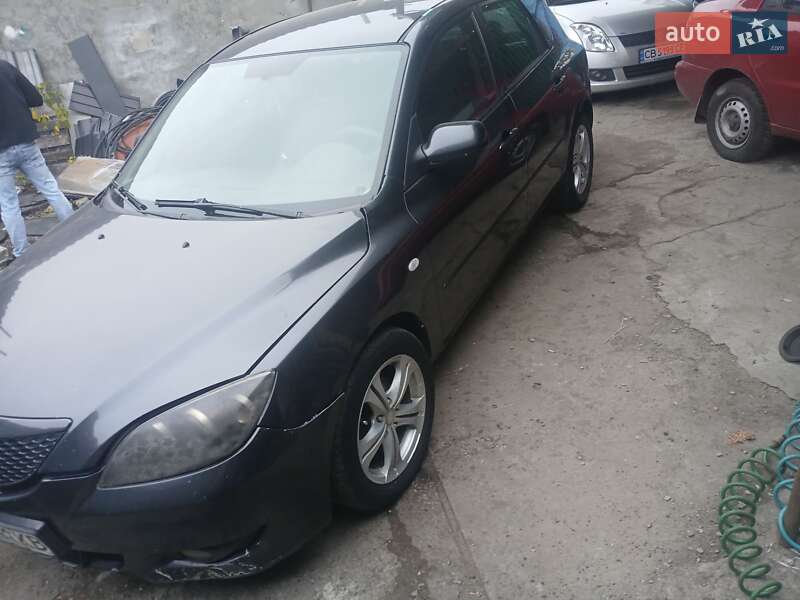 Хетчбек Mazda 3 2005 в  фото Хетчбек Mazda 3 2005 в
