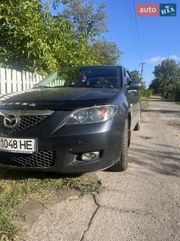 2007 Mazda 3, VIN JM7BK326481371759:plate — фото 1 (autoria)
