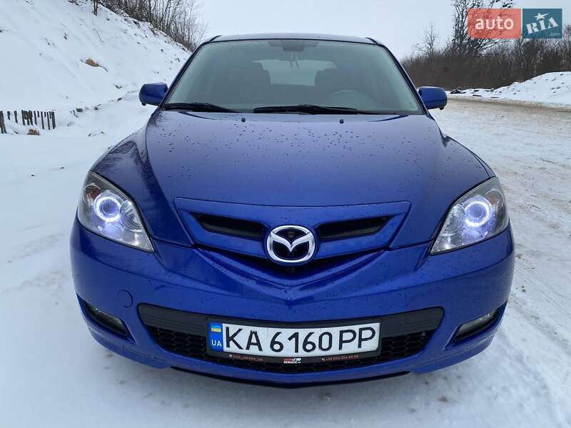 2007 Mazda 3, VIN JM1BK344571720481:plate — фото 1 (autoria)