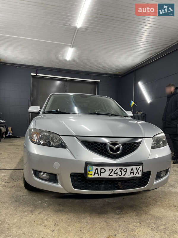 2007 Mazda 3, VIN JMZBK12Z571584248:plate — фото 1 (autoria)