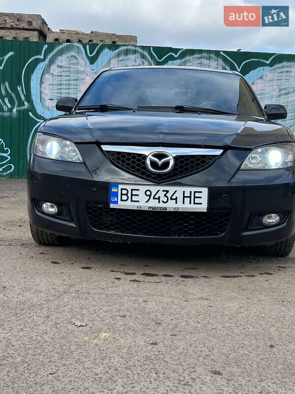 2007 Mazda 3, VIN JM7BK326571354564:plate — фото 1 (autoria)