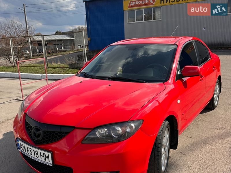 2009 Mazda 3, VIN JMZBK12Z201813609:plate — photo 1 (autoria)
