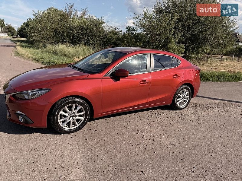 Mazda 3, photos from the listing