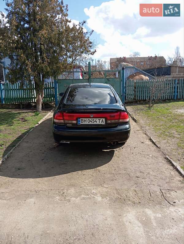 Хэтчбек Mazda 626 1993 в Николаеве фото 4 Хэтчбек Mazda 626 1993 в Николаеве