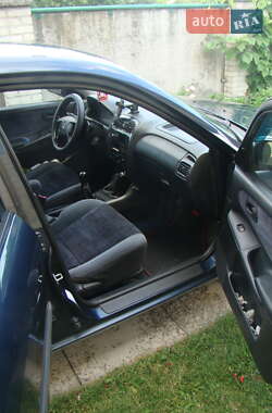 Хетчбек Mazda 626 1999 в 