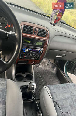 Хэтчбек Mazda 626 1998 в 
