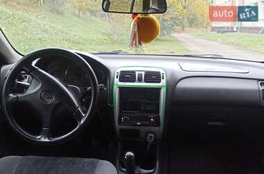 Хэтчбек Mazda 626 1999 в 