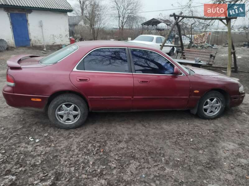 Седан Mazda 626 1995 в Ромнах
