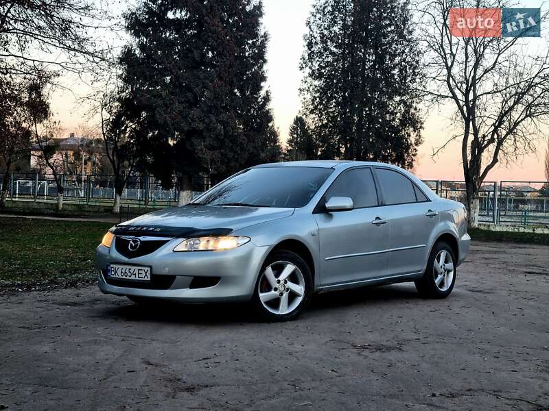 2006 Mazda 6, VIN JMZGG12F771673614:plate — фото 1 (autoria)