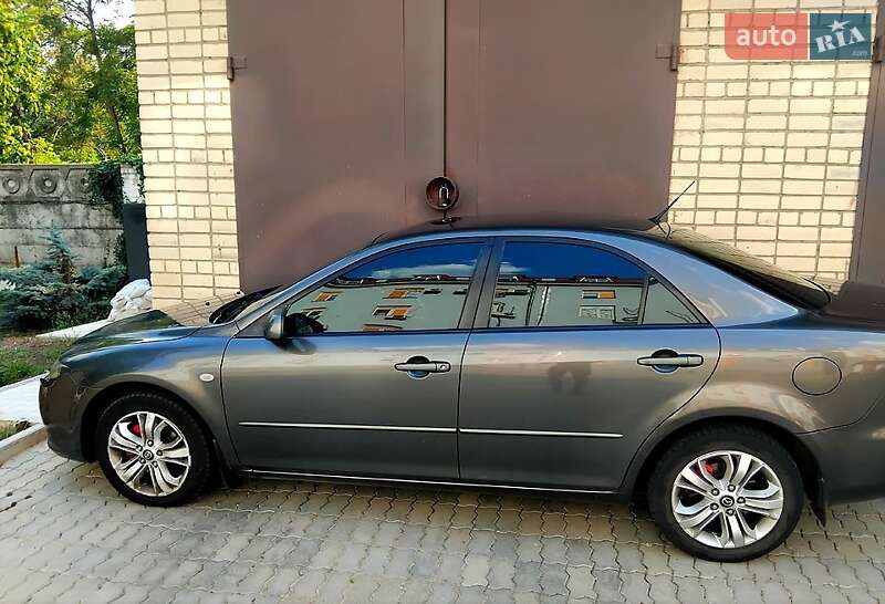 2006 Mazda 6, VIN JMZGG12F661634202:plate — фото 1 (autoria)