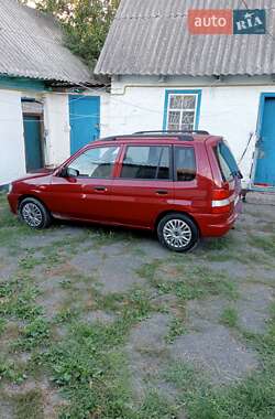 Хэтчбек Mazda Demio 1999 в 