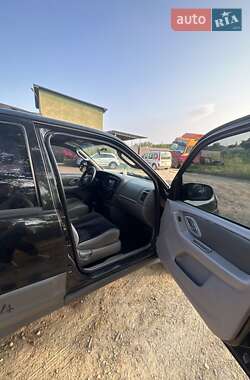 Внедорожник / Кроссовер Mazda Tribute 2002 в 