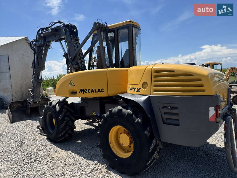 Колісний екскаватор Mecalac 12MXT 2010 в Недобоївцях