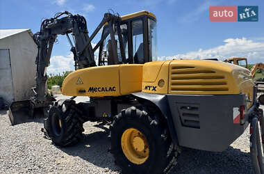Колесный экскаватор Mecalac 12MXT 2010 в 