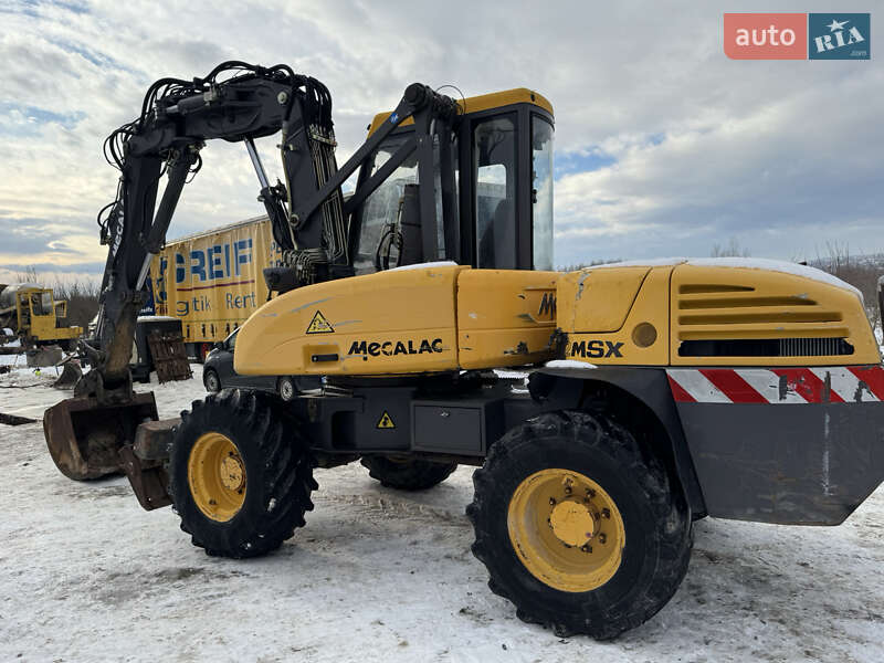 Колесный экскаватор Mecalac 12MXT 2006 в Недобоевцах