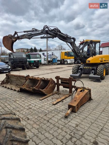 Колесный экскаватор Mecalac 12MXT 2011 в Бучаче