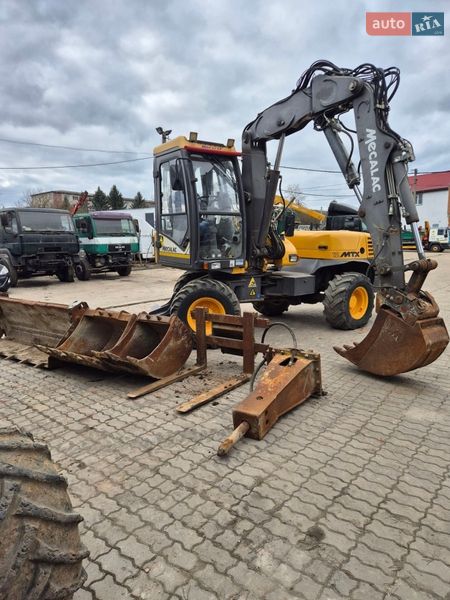Колесный экскаватор Mecalac 12MXT 2011 в Бучаче