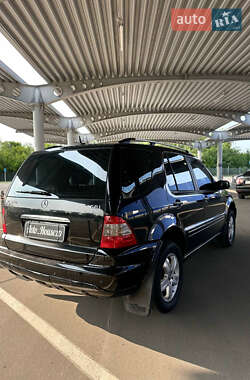 Позашляховик / Кросовер Mercedes-Benz M-Class 2004 в 