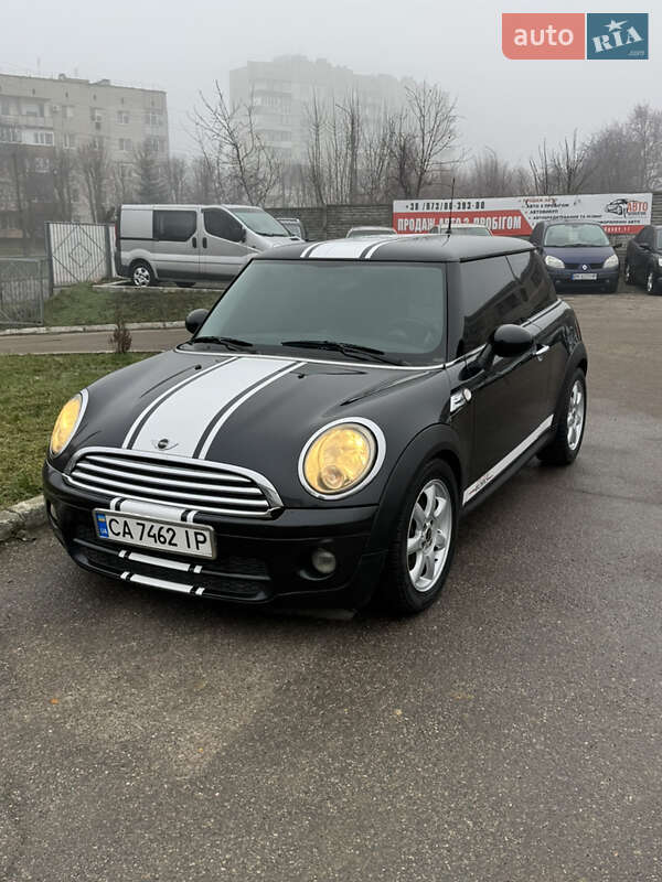 2008 Mini Cooper, VIN WMWMG31050TU56469:plate — фото 1 (autoria)