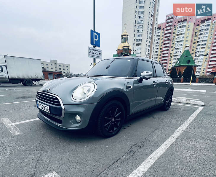2016 Mini Cooper, VIN WMWXT3105G2C97089:plate — photo 1 (autoria)