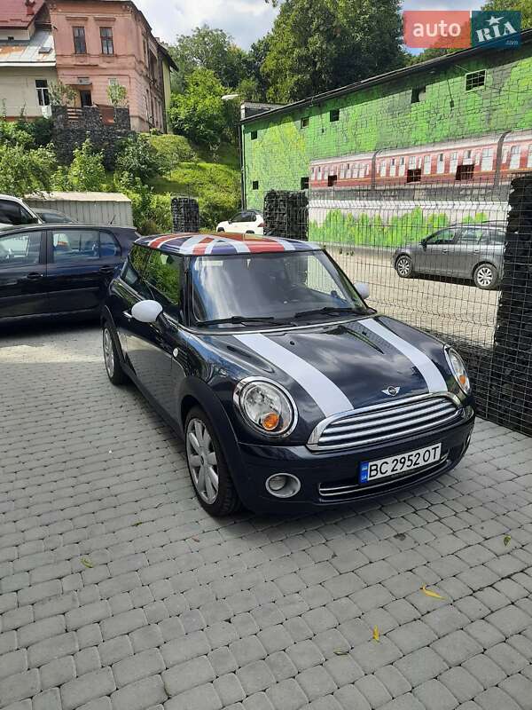 2007 Mini Cooper, VIN WMWMF31060TT70803:plate — фото 1 (autoria)