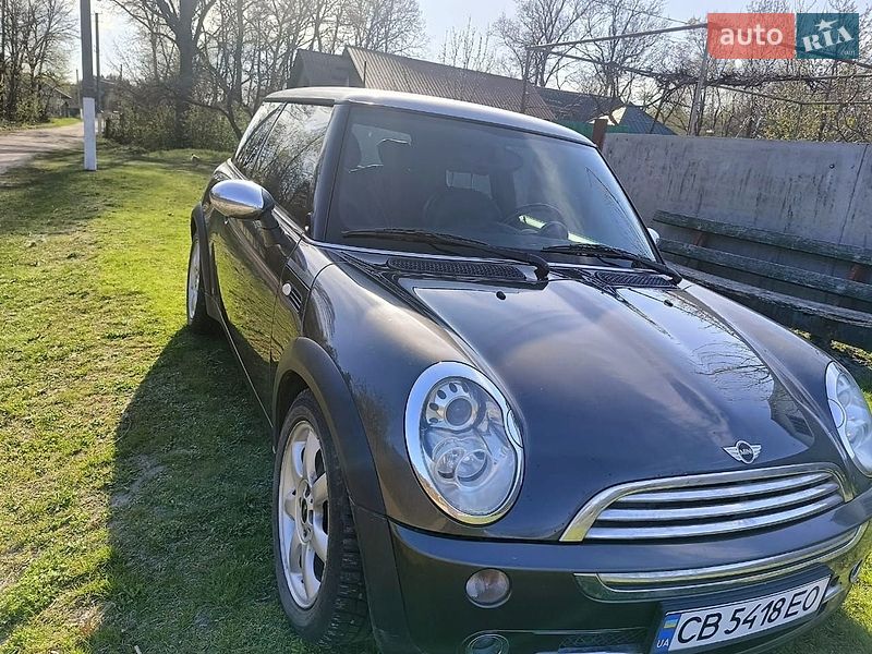 2006 Mini Cooper, VIN WMWRC310X0TK98969:plate — фото 1 (autoria)