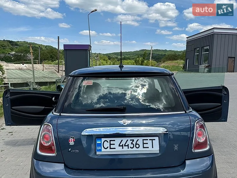 MINI Cooper 2011 VIN WMWSW11080T172140 фото оголошення 4 з 39