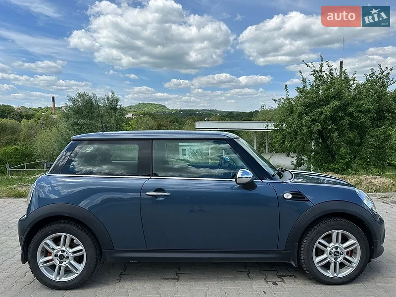 MINI Cooper 2011 VIN WMWSW11080T172140 фото оголошення 3 з 39