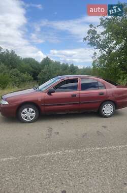 Седан Mitsubishi Carisma 1998 в 