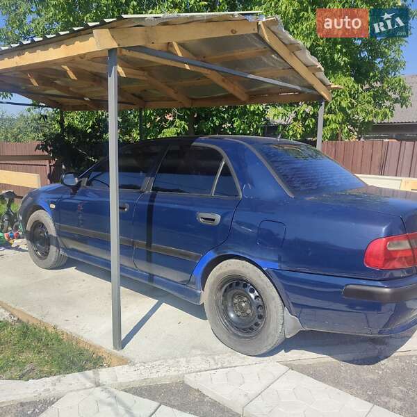 Седан Mitsubishi Carisma 2002 в Винниках