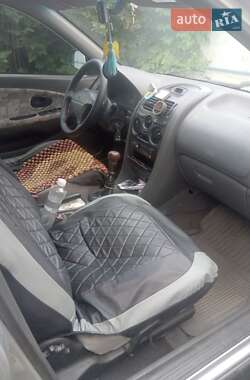 Лифтбек Mitsubishi Carisma 1997 в 