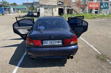 Ліфтбек Mitsubishi Carisma 1996 в  фото 6 Ліфтбек Mitsubishi Carisma 1996 в