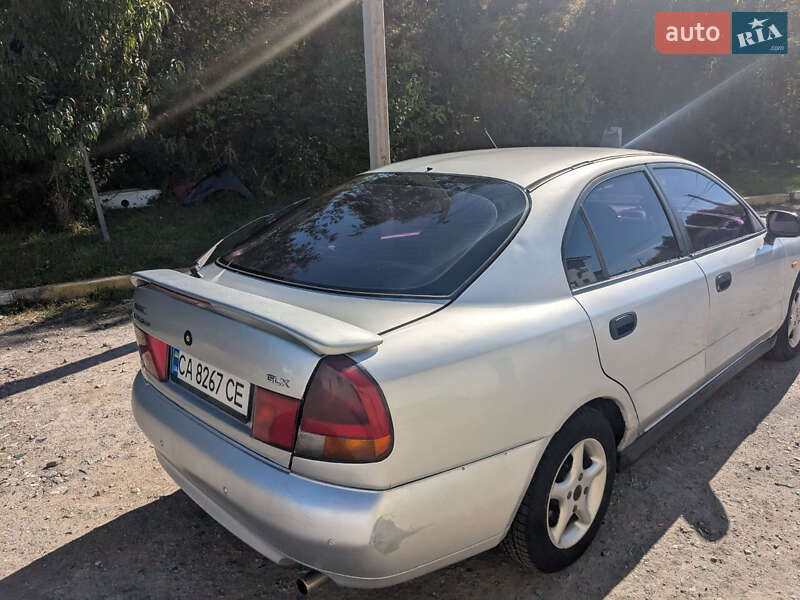 Лифтбек Mitsubishi Carisma 1996 в 