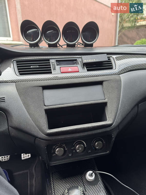 Седан Mitsubishi Lancer Evolution 2006 в Львове фото 24 Седан Mitsubishi Lancer Evolution 2006 в Львове
