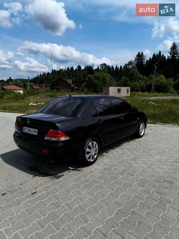 Седан Mitsubishi Lancer 2004 в Сходнице фото 7 Седан Mitsubishi Lancer 2004 в Сходнице