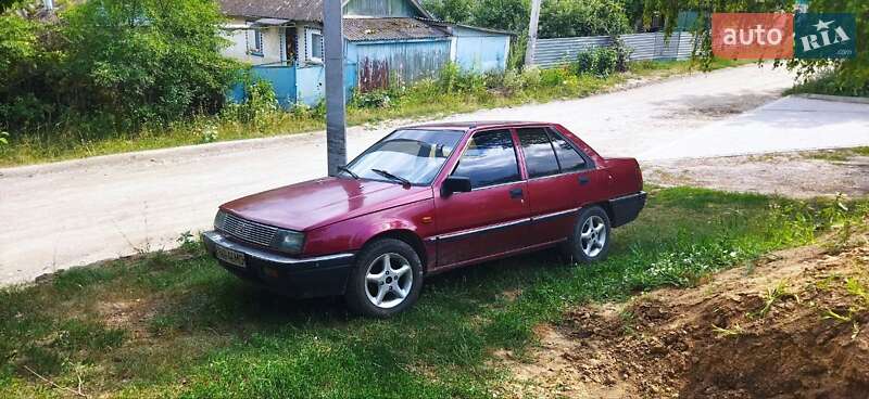 Седан Mitsubishi Lancer 1988 в Городке