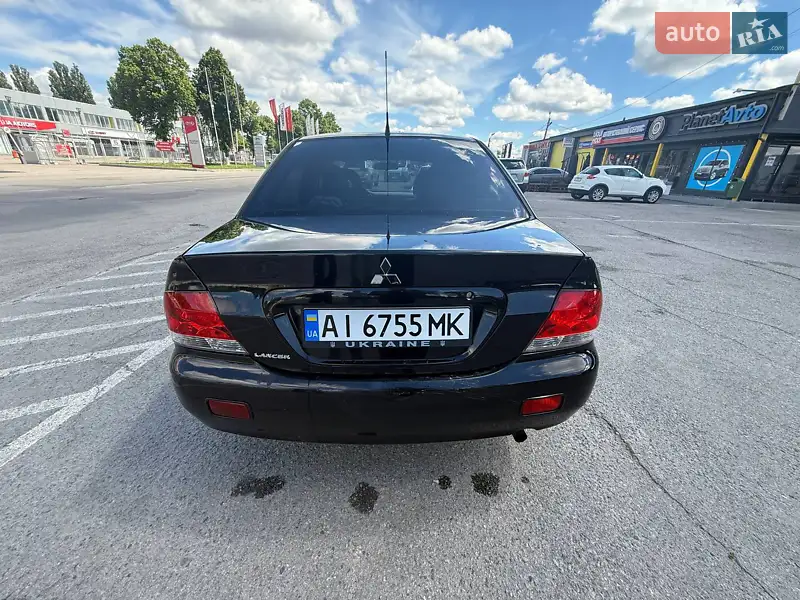 Mitsubishi Lancer 2008 VIN JMBSNCS3A8U000773 фото оголошення 6 з 50