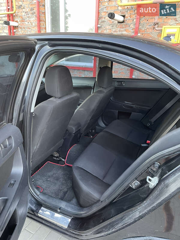 Седан Mitsubishi Lancer 2010 в Полонном