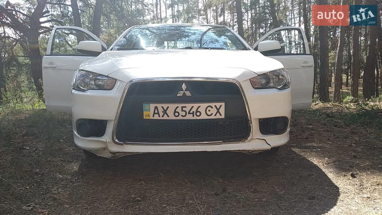 2013 Mitsubishi Lancer - мініатюра 12
