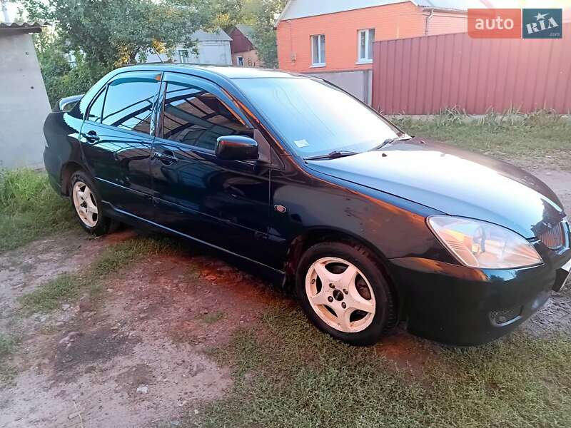 Седан Mitsubishi Lancer 2005 в Ромнах