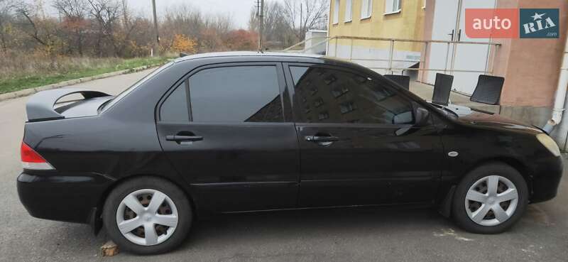 Седан Mitsubishi Lancer 2004 в Новгородці фото 4 Седан Mitsubishi Lancer 2004 в Новгородці