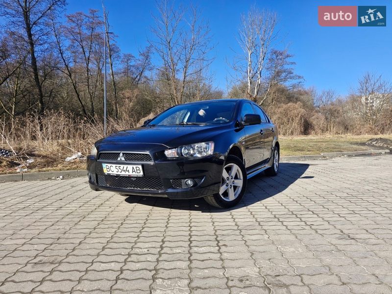 2009 Mitsubishi Lancer, VIN JMBLNCX3A9U007822:plate — фото 1 (autoria)