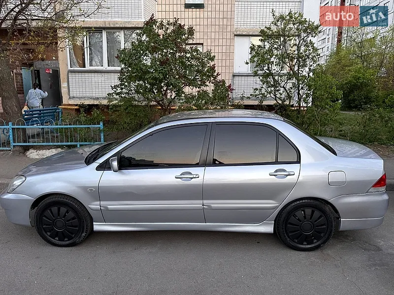 Mitsubishi Lancer 2009 VIN JMBSRCS3A9U000352 фото оголошення 6 з 41