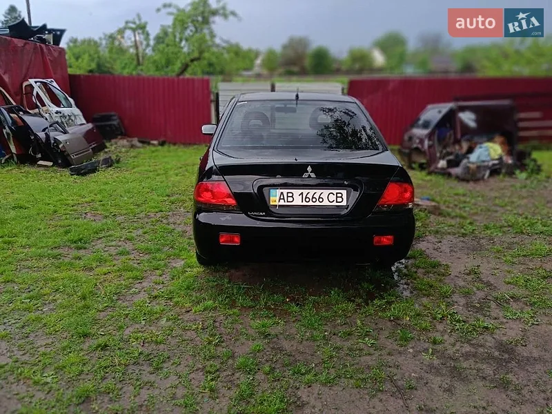 Mitsubishi Lancer 2008 VIN JMBSNCS3A8U004735 фото оголошення 6 з 37