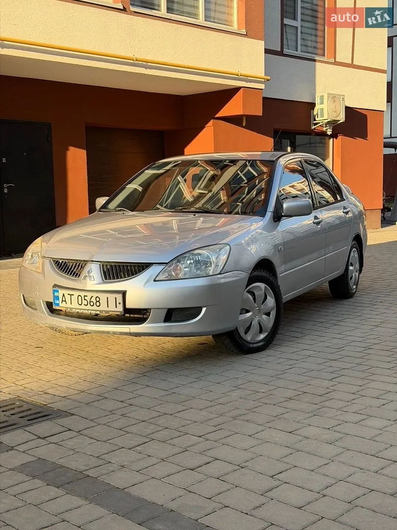 Mitsubishi Lancer 2011 VIN JMBSRCY2ABU009193 фото оголошення 7 з 20