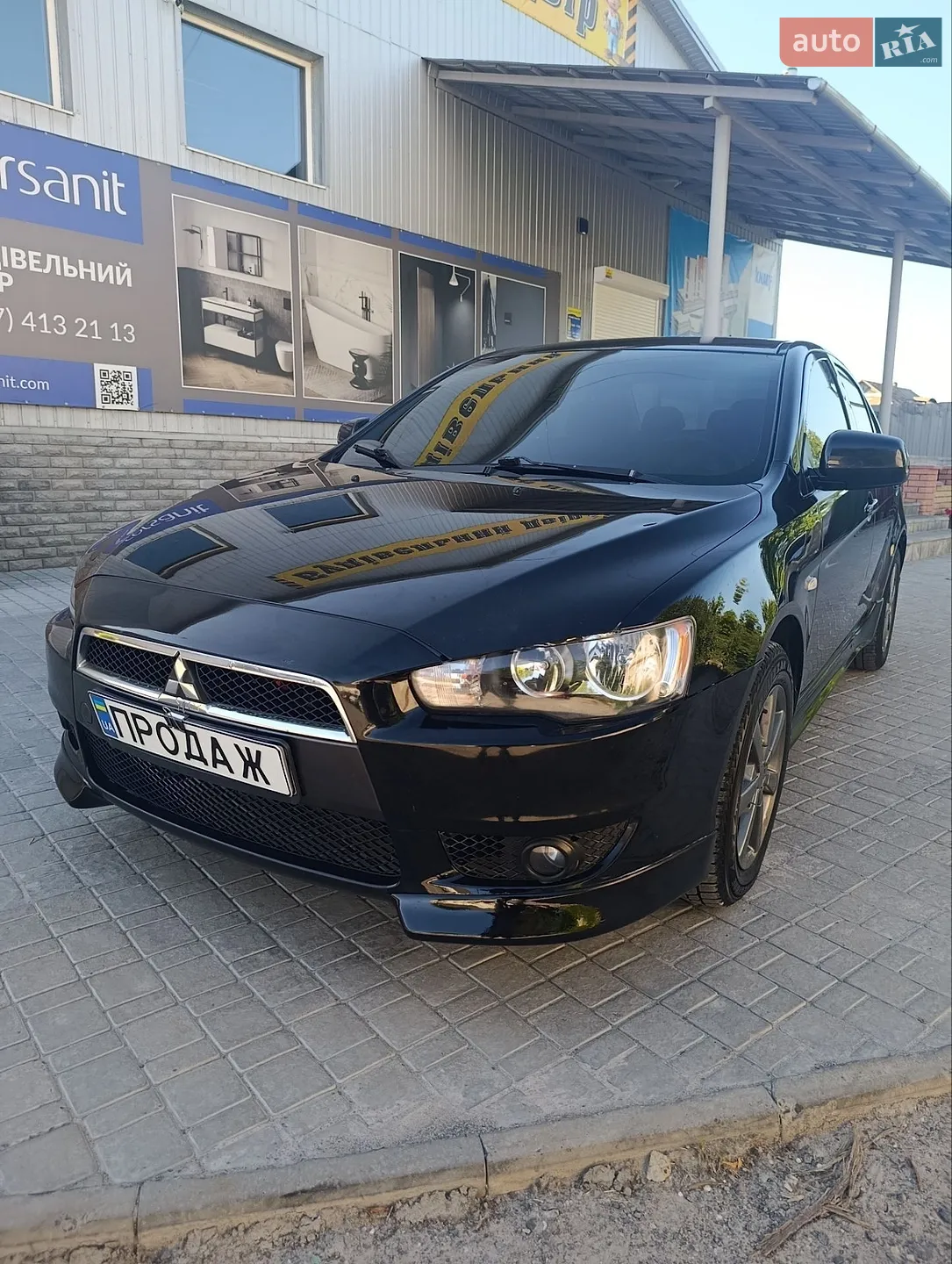 Mitsubishi Lancer 2009 VIN JMBLTCX3A9U002885 фото оголошення 13 з 20