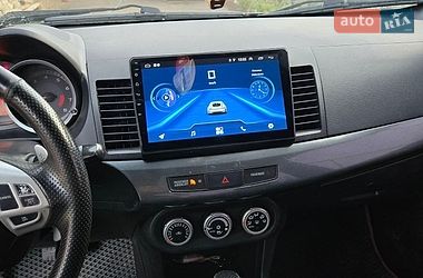 Седан Mitsubishi Lancer 2009 в Великих Лучках