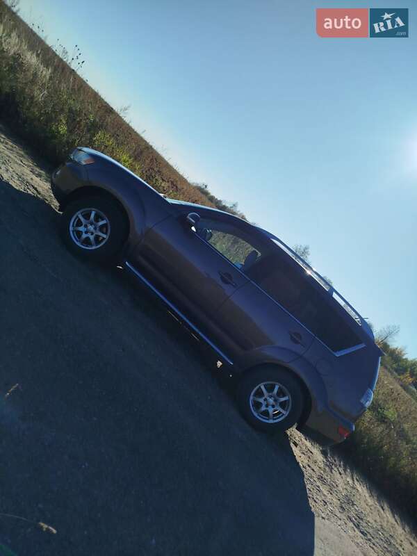 Внедорожник / Кроссовер Mitsubishi Outlander XL 2010 в Самборе фото 12 Внедорожник / Кроссовер Mitsubishi Outlander XL 2010 в Самборе